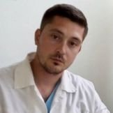Врач Новиков Станислав Григорьевич